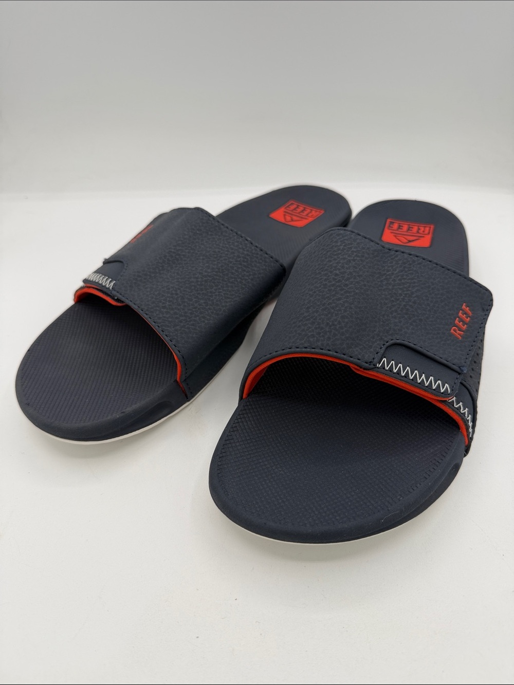 Reef Fanning Slide, navy/orange/white